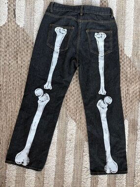 Black Straight Jeans with White Bone Graphic